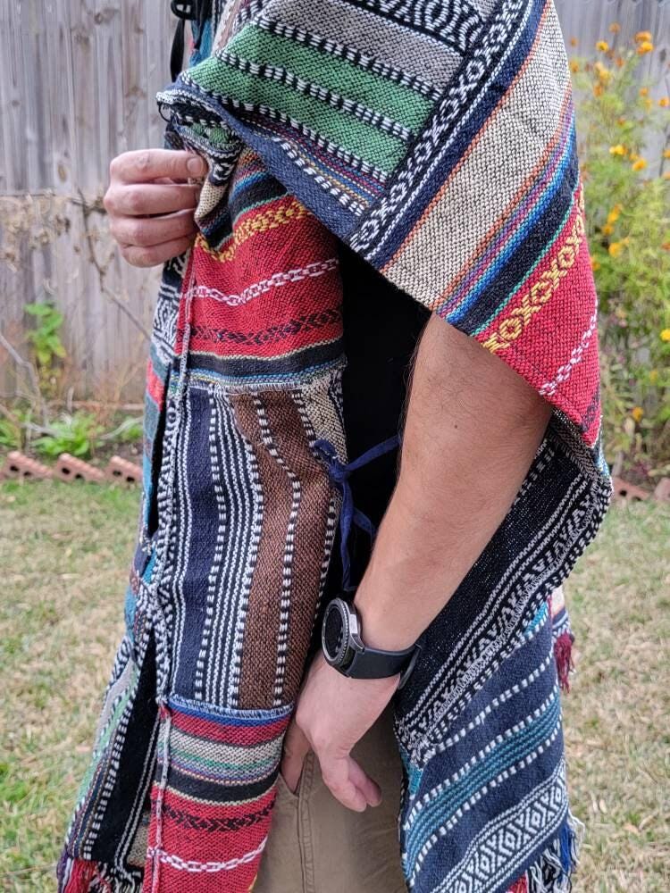 Namaste multicolor rectangular shaped aztec styled handmade beautifully hippie comfy one sized cozy poncho winter unisex cotton pullover.